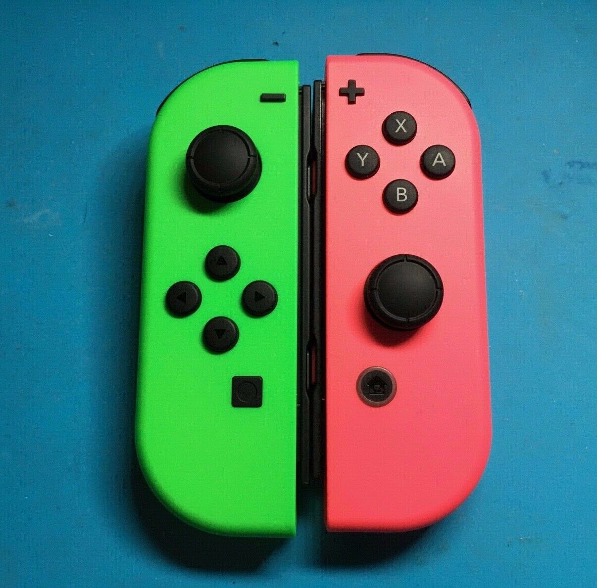 nintendo switch with green and pink